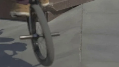 Guy on the bike does the trick and falls Stock Footage 81811317