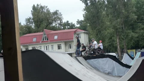 Guy on the bike does the trick on the springboard Stock-Footage 103221040