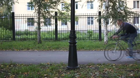 The guy on the bike park Stock Footage 54360433