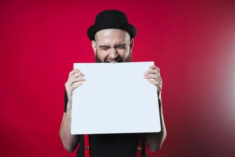 A guy bites a white leaf Stock Photos