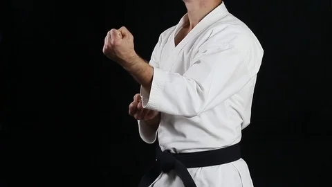 A guy with a black belt does professionally blow 動画素材 69916065