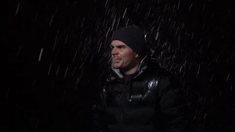 The guy blows a snot, a cold winter evening, the young guy's cold sore Stock Footage 122296069