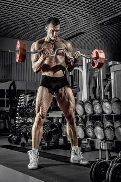 Guy bodybuilder with barbell Foto stock