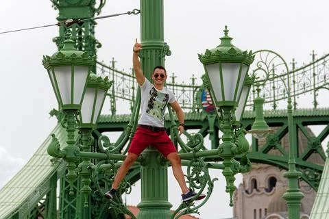 Guy on the bridge. Stock Photos