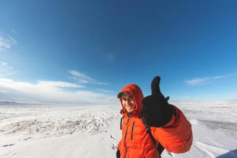 A guy with a briefcase on the background of a pine forest in winter Stock Photos