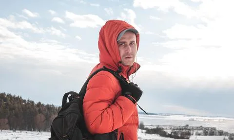 A guy with a briefcase on the background of a pine forest in winter Stock Photos