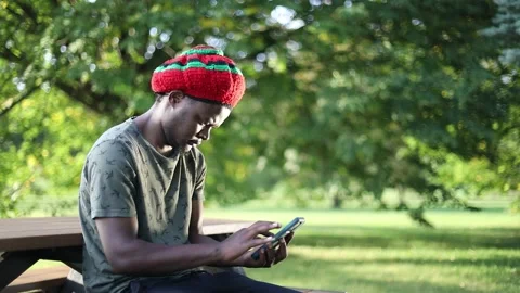 Guy browsing on phone Stock Footage 210646262