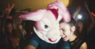 Guy With A Bunny Head With Friends At Party Stock Footage