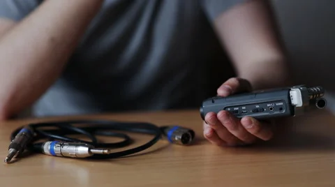 Guy cable connects to the audio recorder Video stock 48914064