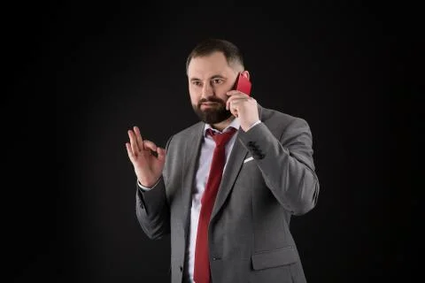 Guy call friend stand black background. Mobile call concept. Man formal suit  Stock Photos
