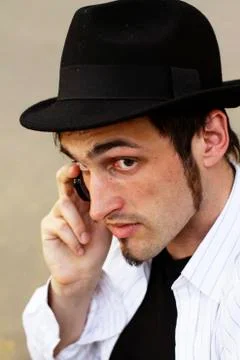 Guy is calling on a mobile phone Stock Photos
