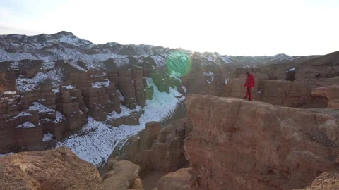 The guy came to the edge of the Charyn Canyon Stock Footage 237741912