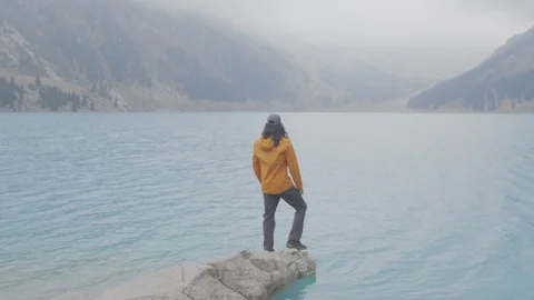 The guy is on a camp in the lake Stock Footage 107813242