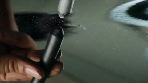 Guy carefully taps dent with special tool removing unevenness Stock Footage 316183403