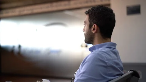 Guy checking boarding pass on airport Stock Footage 89242535