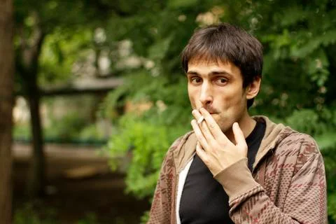 Guy with a cigarette Stock Photos