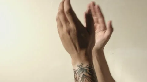 Guy clapping hands together Stock Footage 68652818