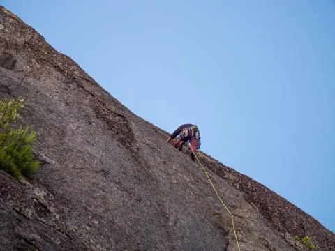 Guy Climbing On The Rock Wall Stock Photos