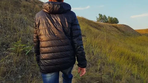 Guy climbs up the path Video stock 80447240