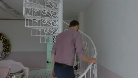 Guy climbs the stairs Stock Footage 86598120