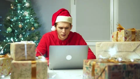 Guy comes up with an idea for the new year.boy writing letter to santa Vidéo 164359728