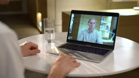 The guy communicates via video link Stock Footage 131511482