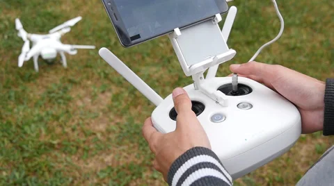 Guy controls drone Stock Footage 64921019