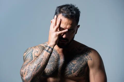 Guy covered face with hands and doing stop gesture with sad and fear expression Stock Photos