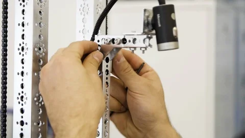 The guy creates and makes a modern robot Stock Footage 121497338