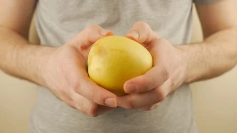 The Guy Crumples An Apple In His Hands Stock-Footage 151218902