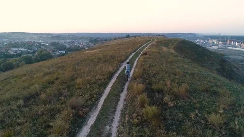 The guy is cycling out of town Stock Footage 130158164