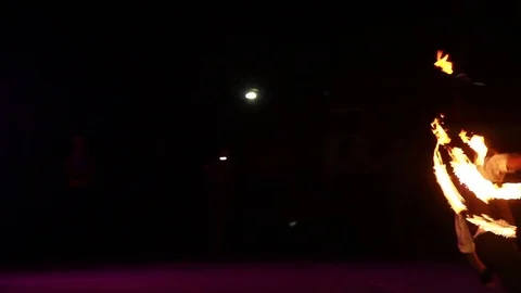 The guy dances with a burning wand Stock Footage 84547766