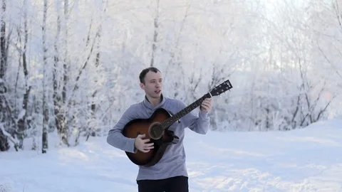 Guy dancing and playing the guitar Video stock 85403848