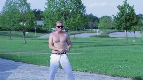 A guy dancing in the street Video stock 78939130