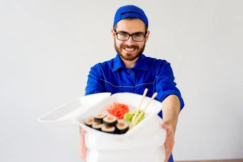 Guy delivering sushi Stock Photos