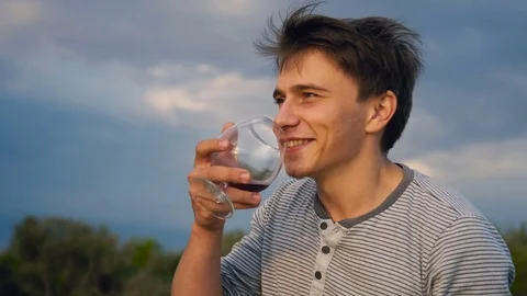 The guy is depressed drinking wine Stock Footage 81391487