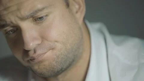 The guy detective in a white shirt listens to the interlocutor Stock Footage 99351453