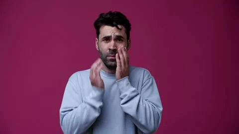 The guy did something bad and he is very uncomfortable because of it Stock Footage 162842004