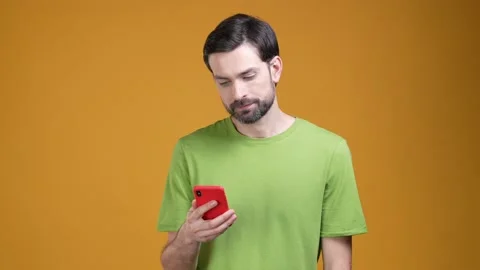 Guy dislike call device hide he enjoy talk isolated shine color background Stock Footage 204990443