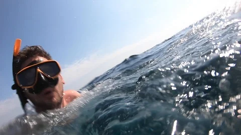 The guy dives into the water. Stock Footage 123972592