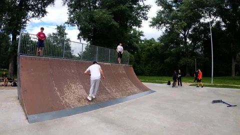A guy does acrobatic tricks at a skatepark in Sumy, Ukraine Stock Footage 276905000