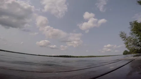 Guy does cartwheel flip off dock into water Stock Footage 52427432