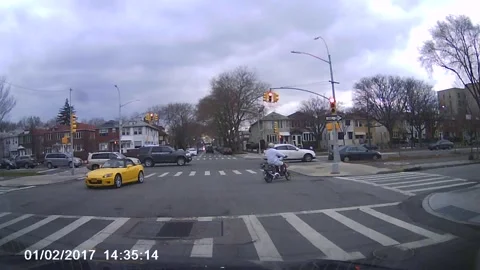 Guy Does Donuts at a Red Light, Brooklyn, New York - 01 Feb 2017 Stock Footage 205303885
