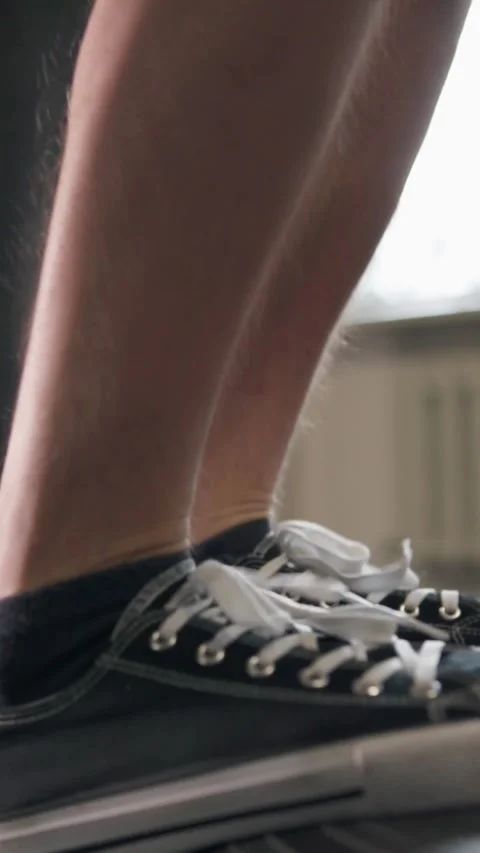 A guy does a hard workout, jumps on a big tire and becomes very strong. Stock Footage 302432945