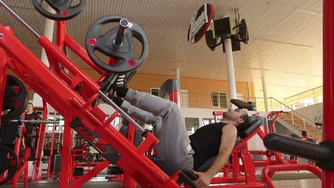 The guy does the leg exercise Stock Footage 73988978