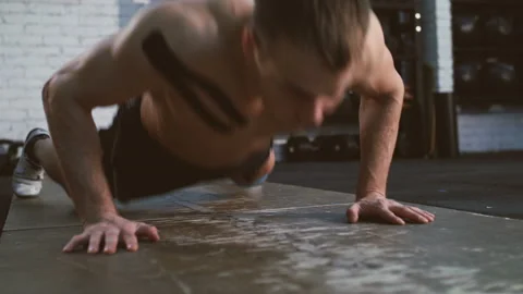 Guy doing burpee jumping. Stock Footage 96653099