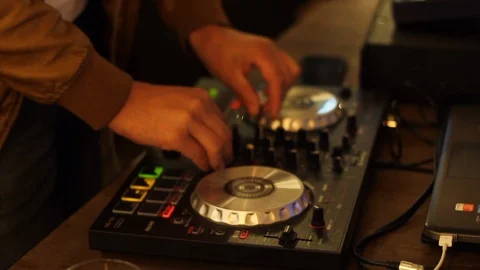 Guy doing DJ mixing Stock Footage 115180598