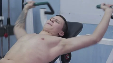 Guy doing exercise in chest Stock Footage 57294261