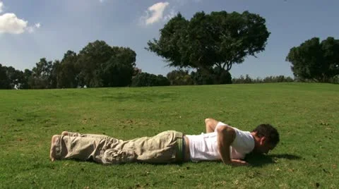Guy doing Push-Ups at park Stock-Footage 20510203