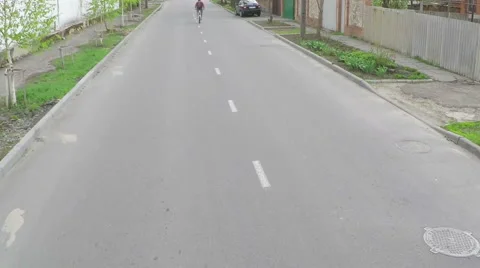 The guy doing stunts on a bicycle - aerial survey Stock Footage 49709395